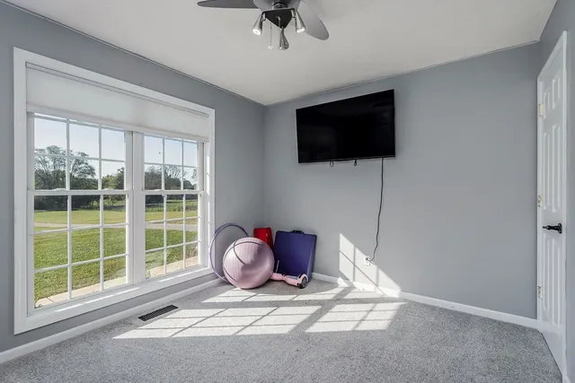 a view of storage and utility room with washer and dryer