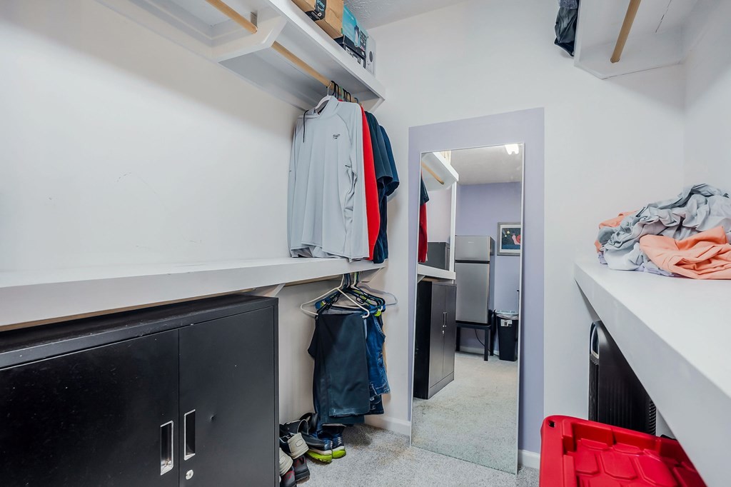 1945 Golden Mountain Road Sparta, TN 38583 - Photo 26 of 47 a view of walk in closet with clothes and shoes