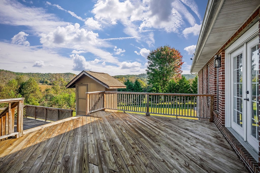 1945 Golden Mountain Road Sparta, TN 38583 - Photo 35 of 47 a view of a house with a wooden deck