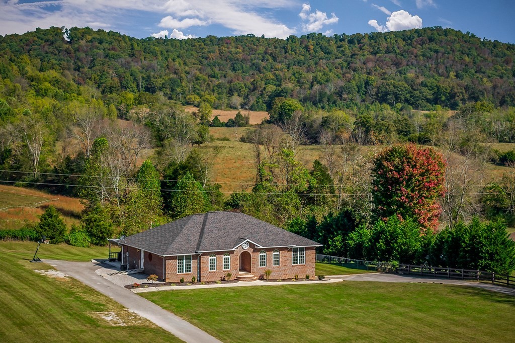 1945 Golden Mountain Road Sparta, TN 38583 - Photo 39 of 47 an aerial view of a house with swimming pool and a yard