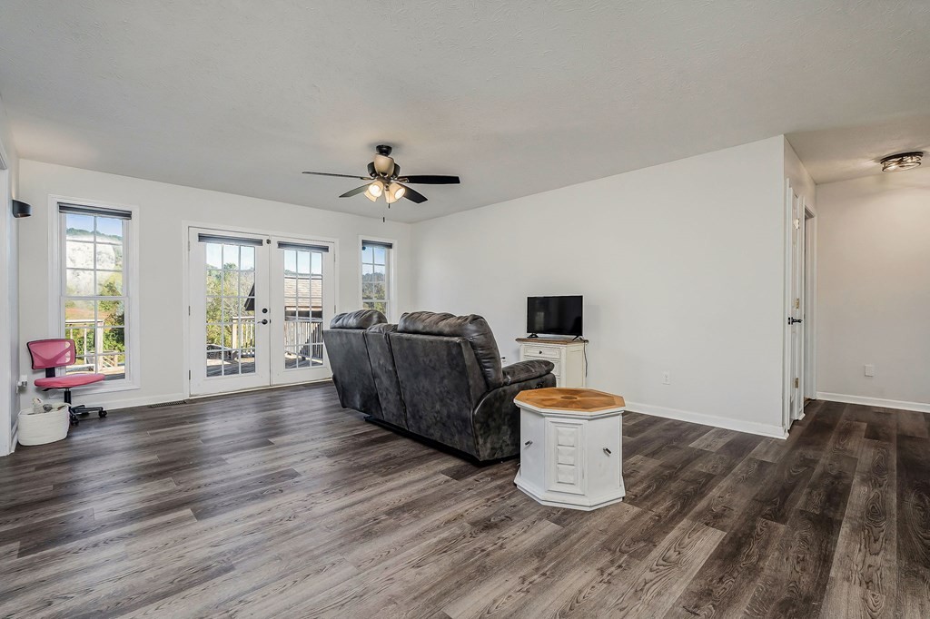 1945 Golden Mountain Road Sparta, TN 38583 - Photo 7 of 47 a living room with furniture and a wooden floor