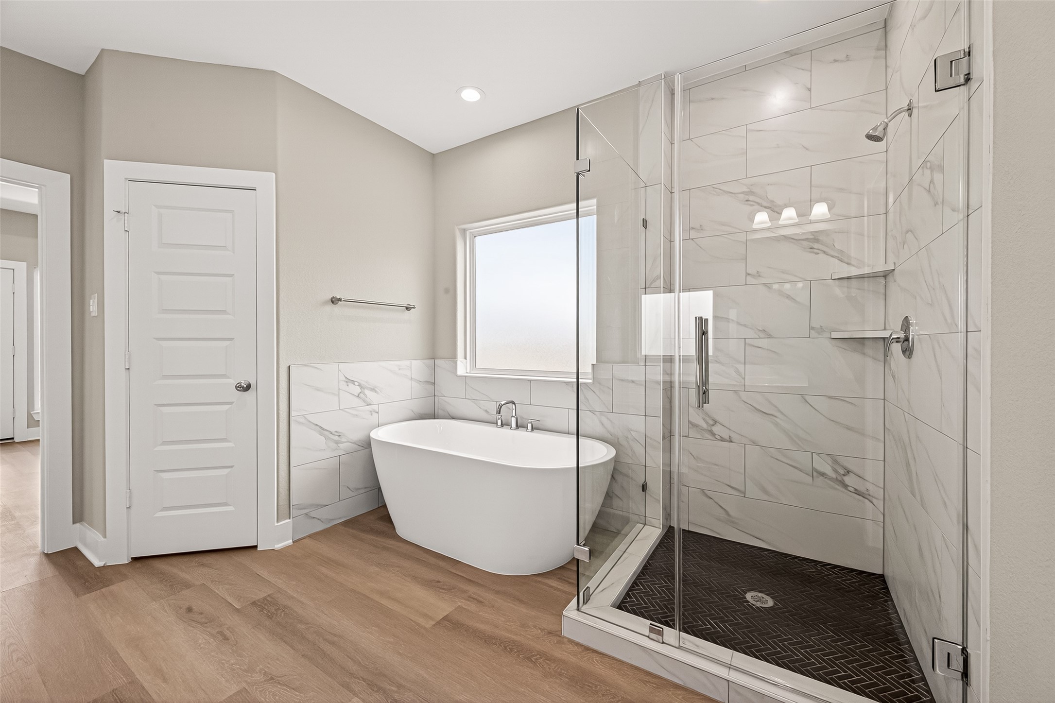 3514 Runnels Street, Unit B Houston, TX 77003 - Photo 19 of 39 Separate shower and deep soaking tub, private WC. Sophisticated details and tilework.