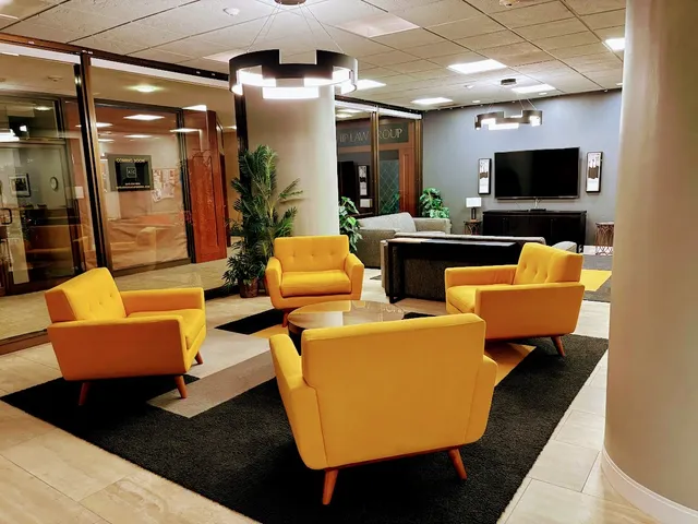 a view of swimming pool with a yard and green space