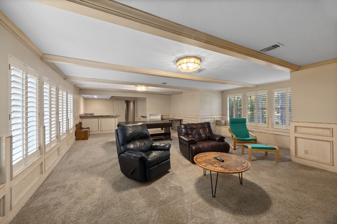 8807 Chelmsford Lane Spring, TX 77379 - Photo 41 of 50 a living room with furniture a large window and chairs