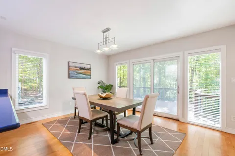 a view of a balcony with wooden floor