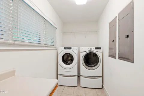 a bathroom with a sink vanity and a mirror