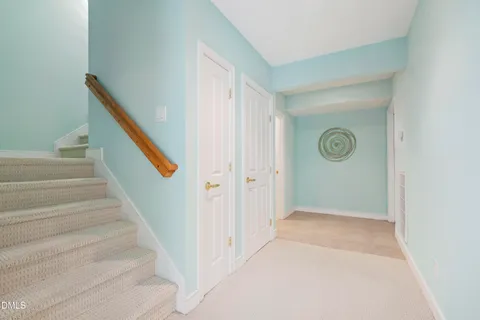 a bathroom with a granite countertop sink mirror bathtub and toilet