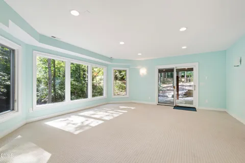 a white bath tub sitting in a bathroom