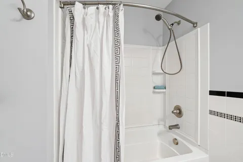 a bedroom with a bed and cabinets