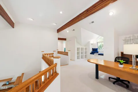 a view of a backyard with sitting area