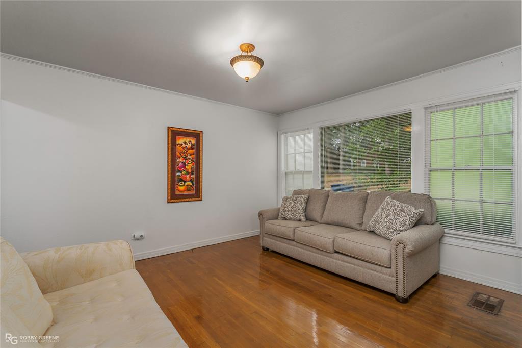 515 Davis Street Minden, LA 71055 - Photo 8 of 28 a living room with furniture and a large window