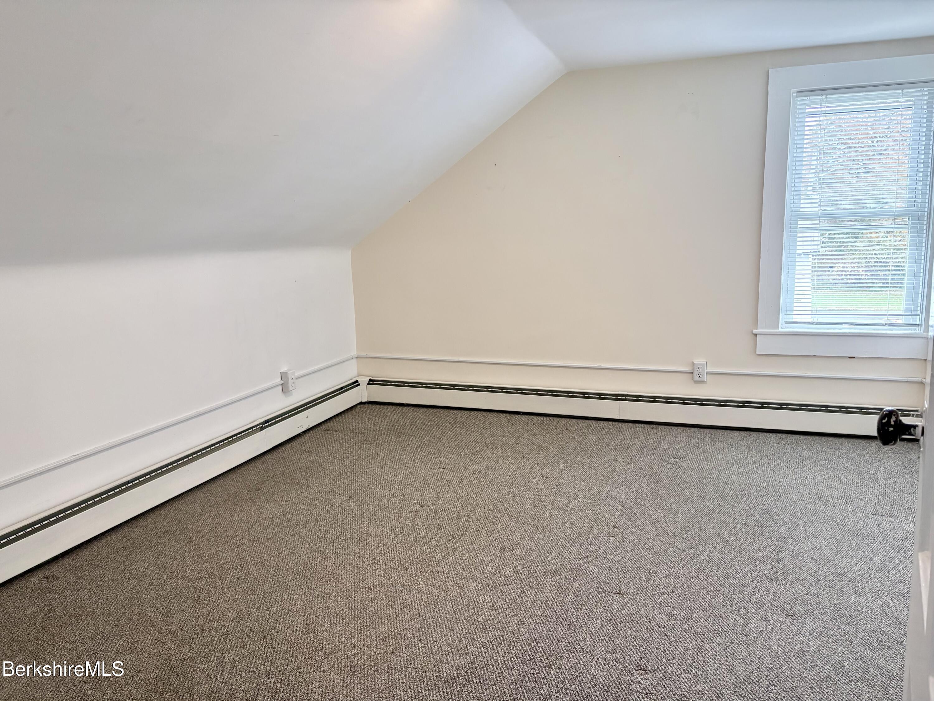 50 Temple Street Adams, MA 01220 - Photo 13 of 13 a view of a room with an empty space and window