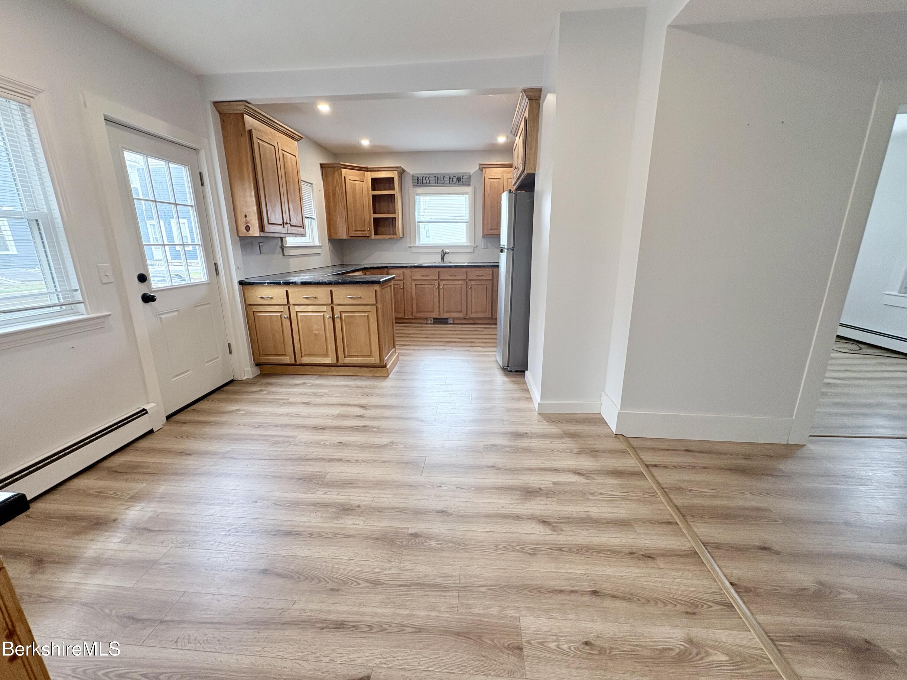 50 Temple Street Adams, MA 01220 - Photo 5 of 13 a view of a kitchen with a sink cabinets and a window