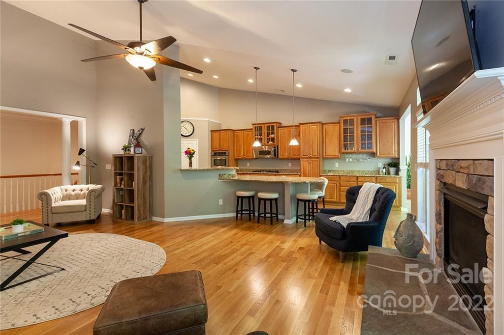 1292 Valhalla Drive Denver, NC 28037 - Photo 11 of 47 a living room with furniture and a fireplace