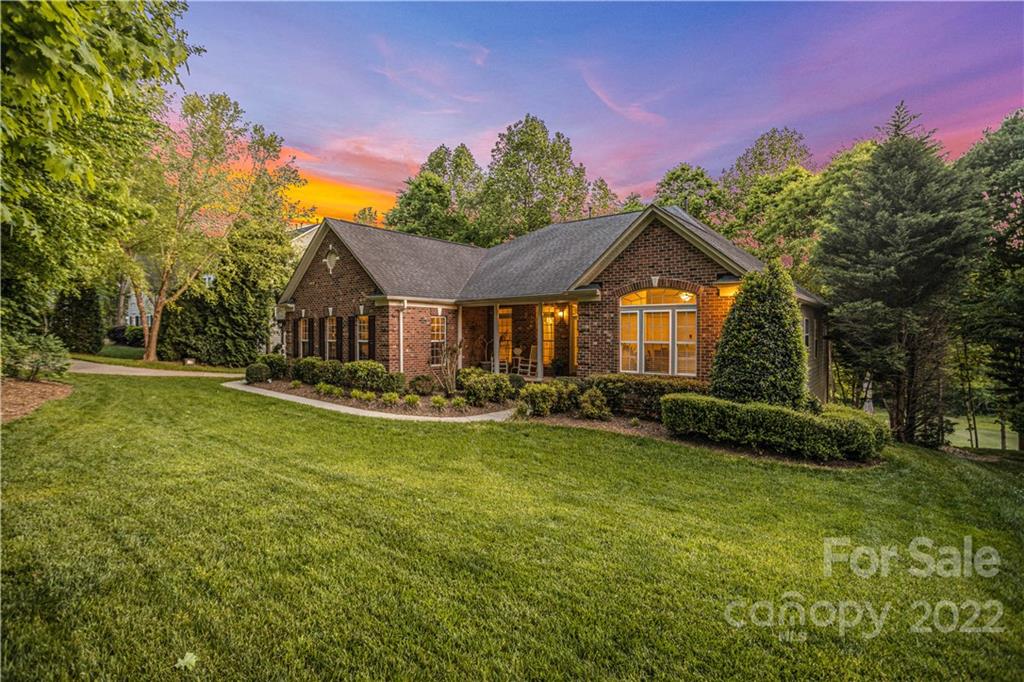 1292 Valhalla Drive Denver, NC 28037 - Photo 2 of 47 a front view of a house with garden