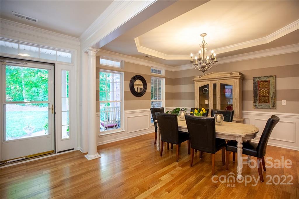 1292 Valhalla Drive Denver, NC 28037 - Photo 25 of 47 a view of a dining room with furniture window and wooden floor