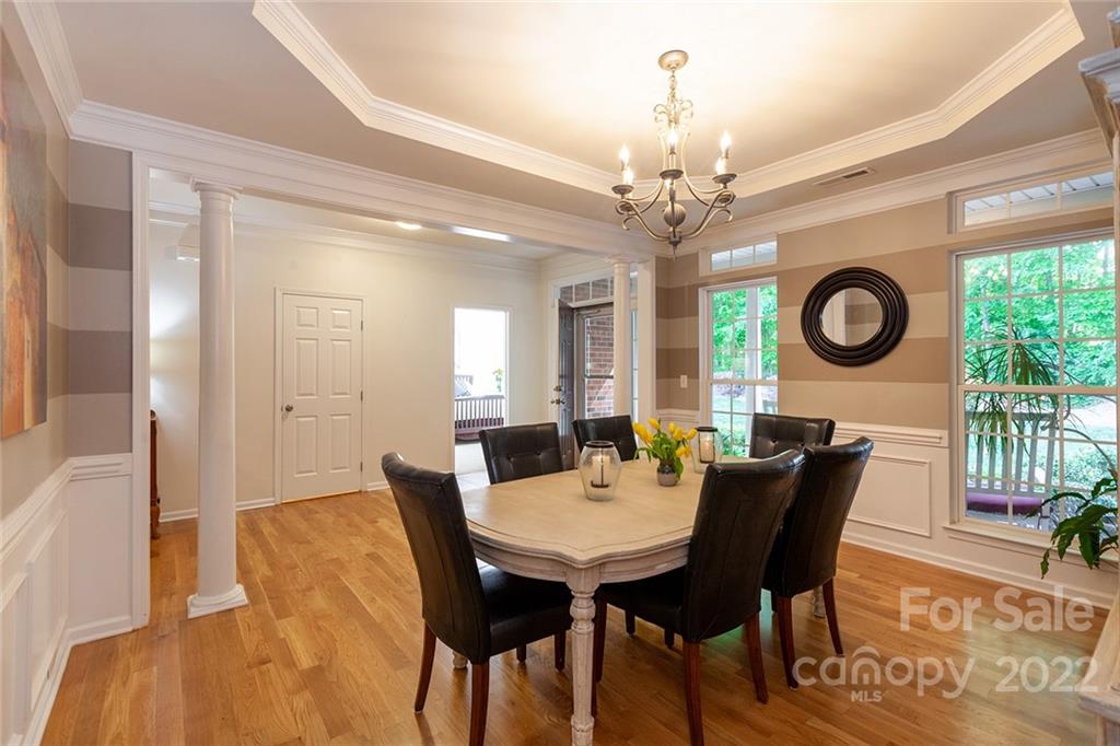 1292 Valhalla Drive Denver, NC 28037 - Photo 26 of 47 a view of a dining room with furniture window and wooden floor