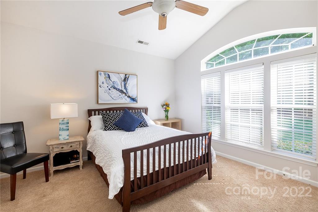 1292 Valhalla Drive Denver, NC 28037 - Photo 29 of 47 a bedroom with a bed and a window