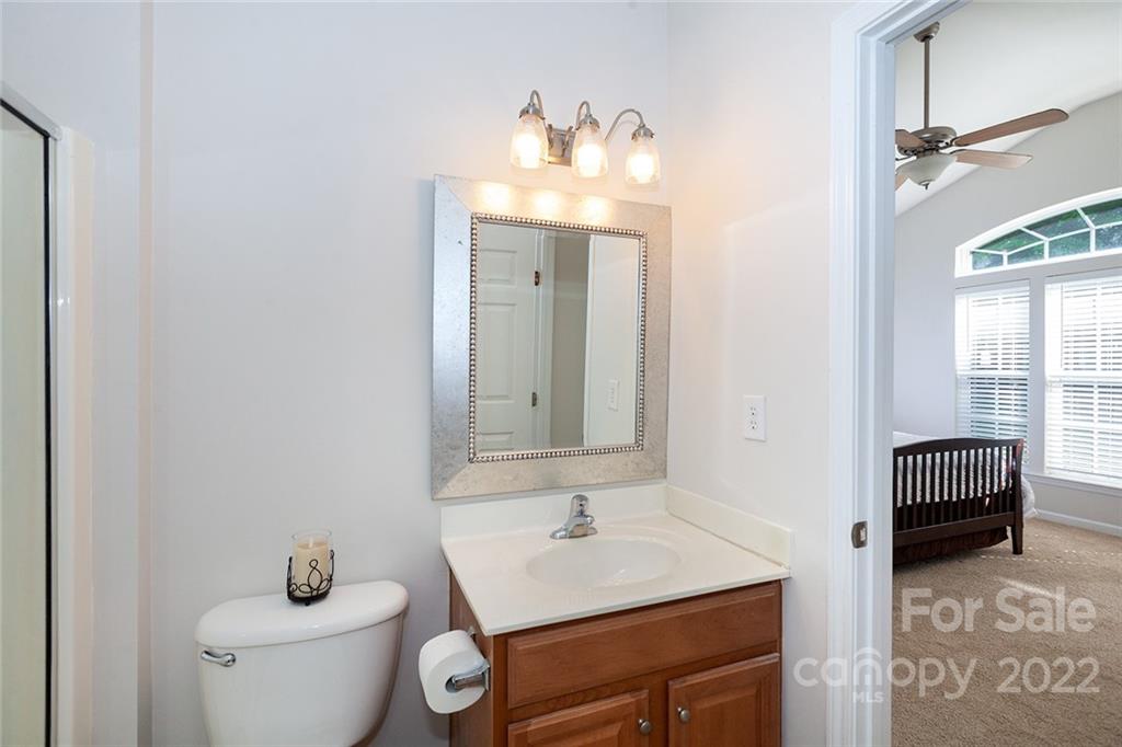1292 Valhalla Drive Denver, NC 28037 - Photo 30 of 47 a bathroom with a sink toilet and mirror