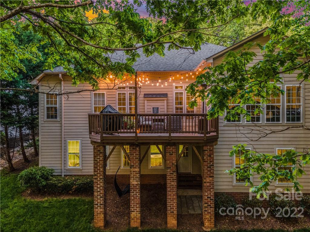 1292 Valhalla Drive Denver, NC 28037 - Photo 3 of 47 a front view of a house with balcony and garden