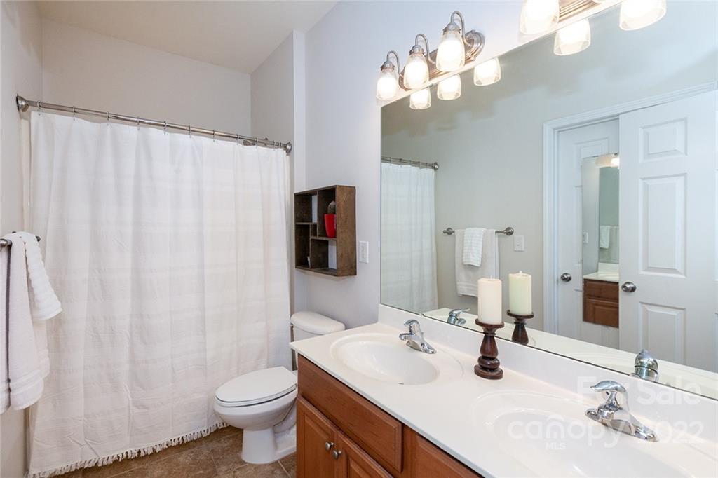 1292 Valhalla Drive Denver, NC 28037 - Photo 32 of 47 a bathroom with a sink vanity mirror and toilet