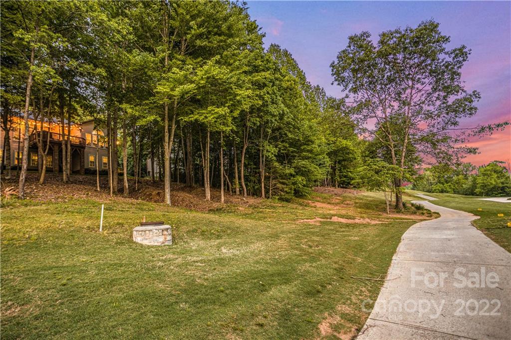 1292 Valhalla Drive Denver, NC 28037 - Photo 5 of 47 a view of a swimming pool with a patio