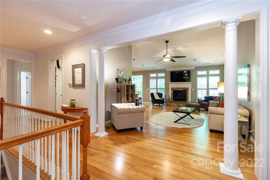 1292 Valhalla Drive Denver, NC 28037 - Photo 8 of 47 a view of a living room and kitchen floor to ceiling window