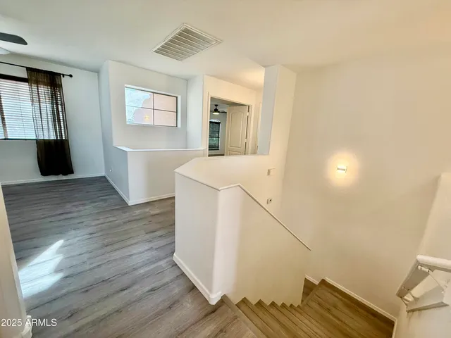 a view of a kitchen from the hallway