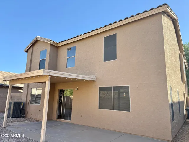 a house view with a outdoor space
