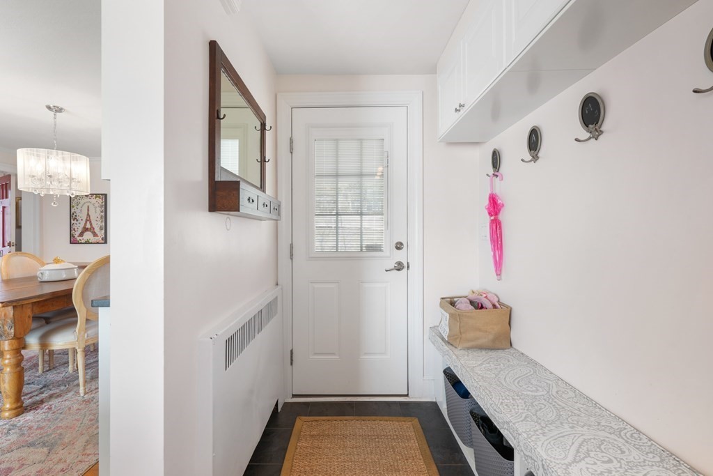 63 Standish Road Milton, MA 02186 - Photo 11 of 38 a bathroom with a tub and shower