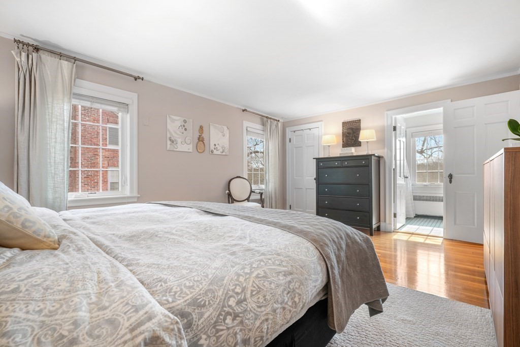 63 Standish Road Milton, MA 02186 - Photo 17 of 38 a bedroom with a bed and dresser