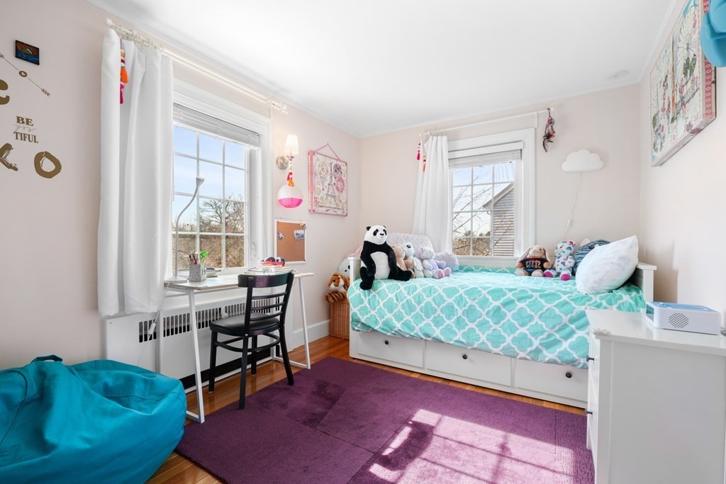 63 Standish Road Milton, MA 02186 - Photo 21 of 38 a bedroom with furniture and a large window