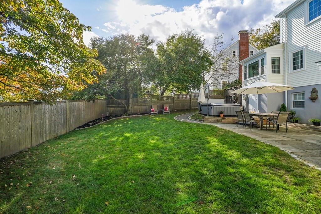 63 Standish Road Milton, MA 02186 - Photo 32 of 38 a view of a backyard with sitting area