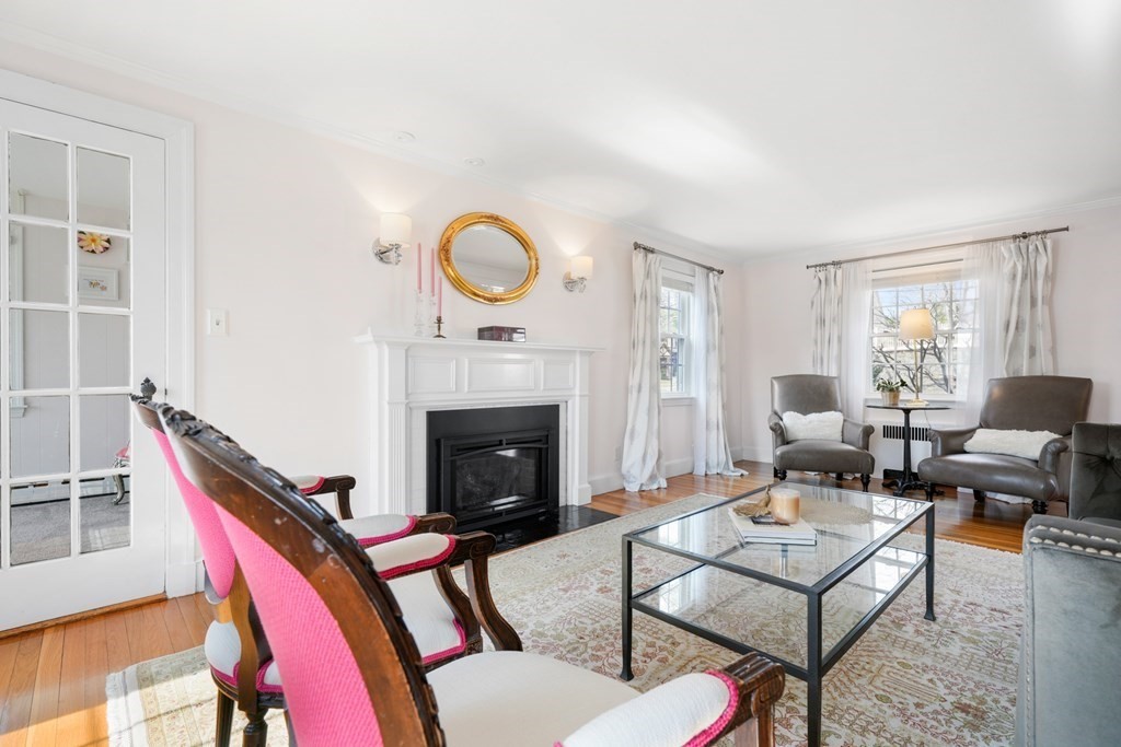 63 Standish Road Milton, MA 02186 - Photo 5 of 38 a living room with furniture and a fireplace