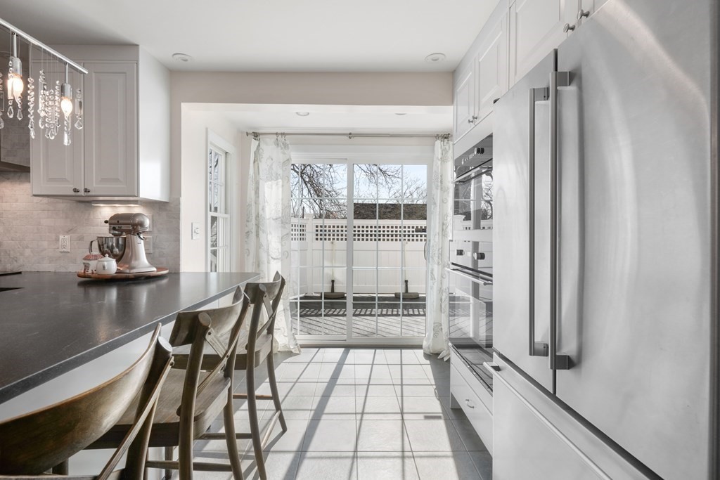 63 Standish Road Milton, MA 02186 - Photo 10 of 38 a view of a dining room with furniture and window