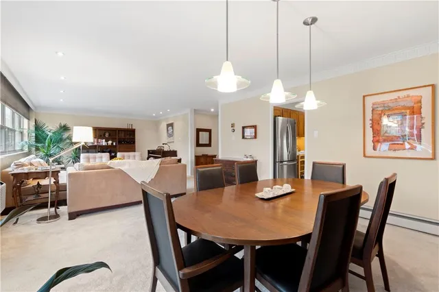 a view of a dining room with furniture
