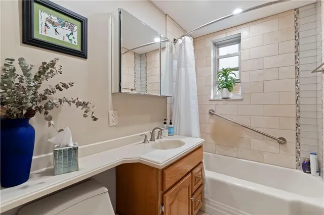 a bathroom with a sink and a bathtub