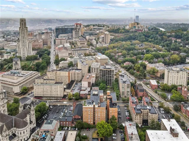 a view of a city with tall buildings