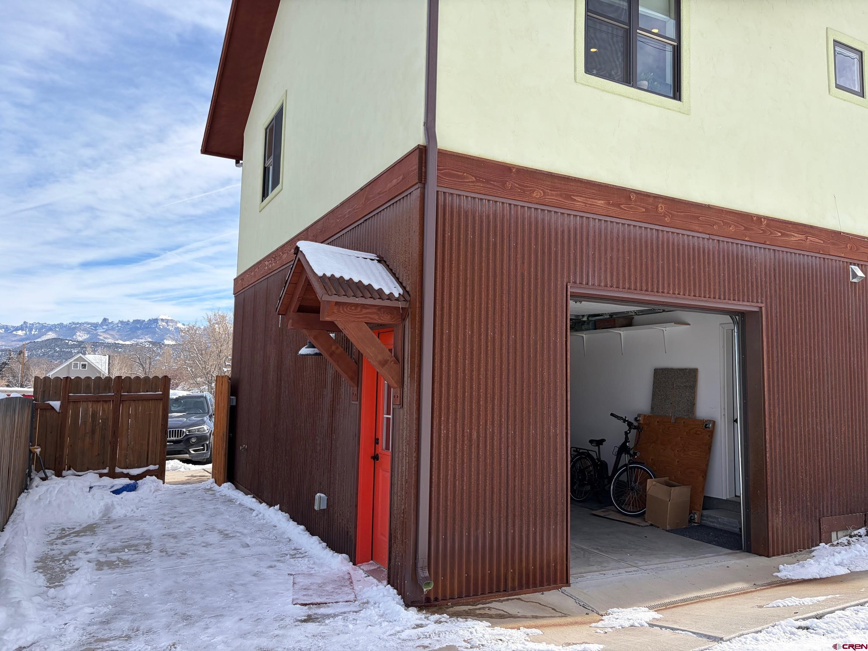 139 South Charlotte Street Ridgway, CO 81432 - Photo 19 of 26 a view of a house with a balcony