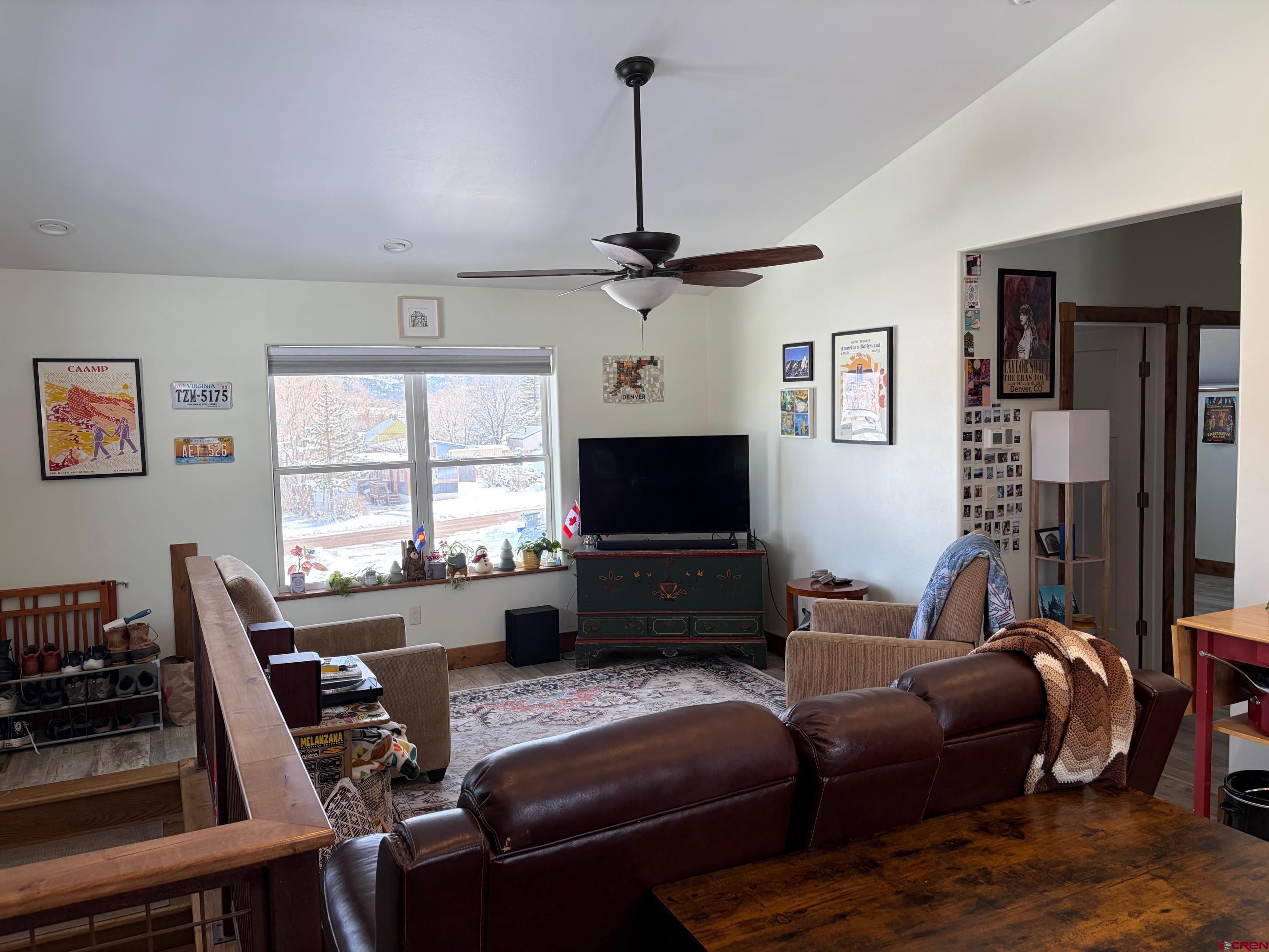 139 South Charlotte Street Ridgway, CO 81432 - Photo 9 of 26 a living room with furniture a flat screen tv and a window