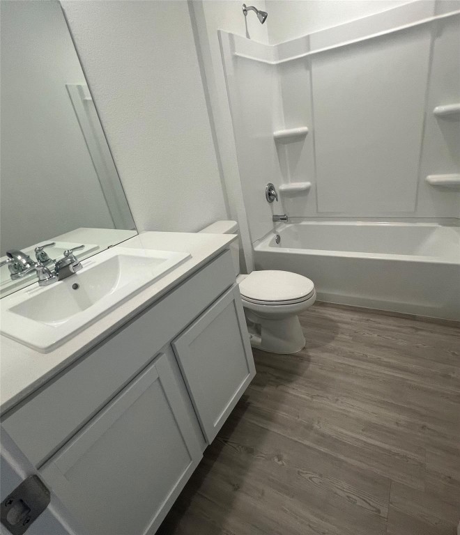 10418 Rocky Trail Beasley, TX 77417 - Photo 5 of 19 a bathroom with a sink a toilet and shower