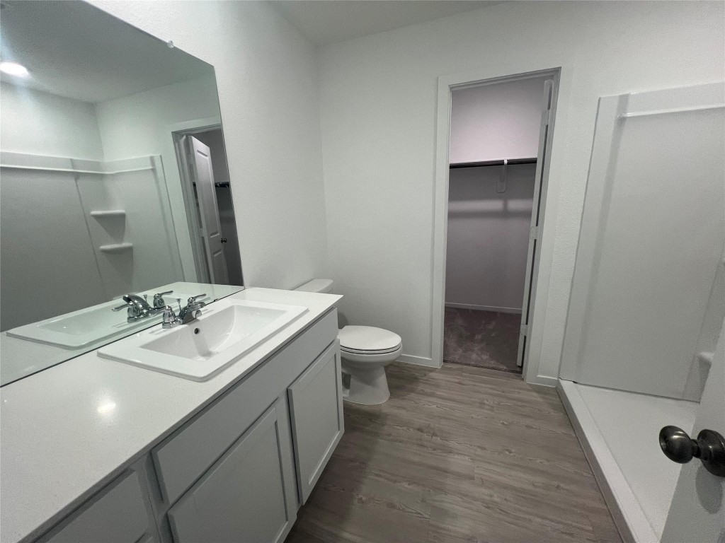 10418 Rocky Trail Beasley, TX 77417 - Photo 7 of 19 a bathroom with a sink toilet and shower