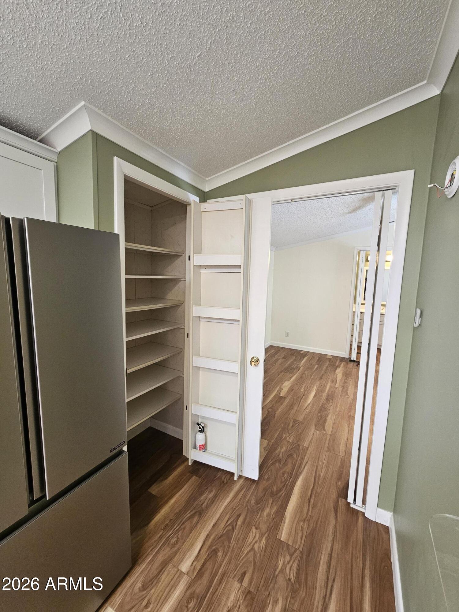 654 Nature Way Sierra Vista, AZ 85635 - Photo 13 of 35 a view of walk in closet with empty racks