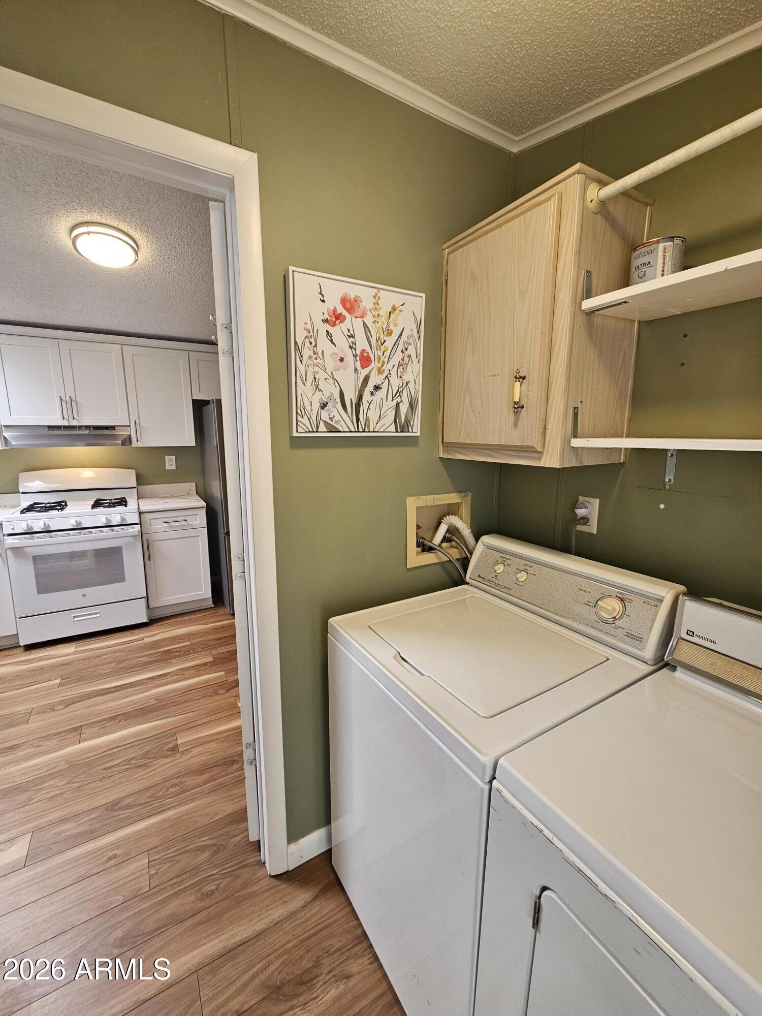 654 Nature Way Sierra Vista, AZ 85635 - Photo 16 of 35 a utility room with dryer and washer