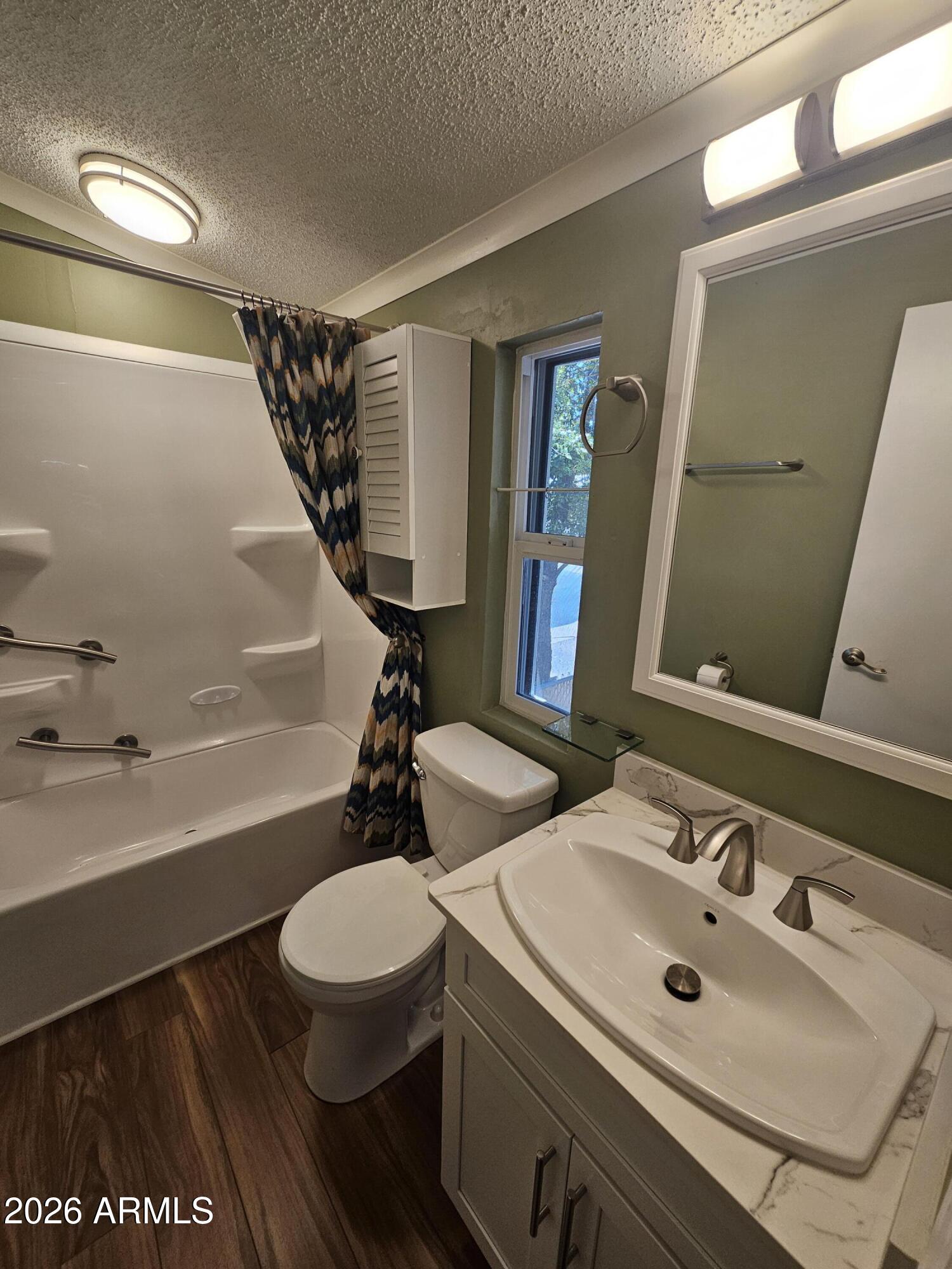 654 Nature Way Sierra Vista, AZ 85635 - Photo 25 of 35 a bathroom with a sink and a mirror
