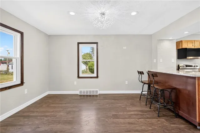 a workspace with furniture and window