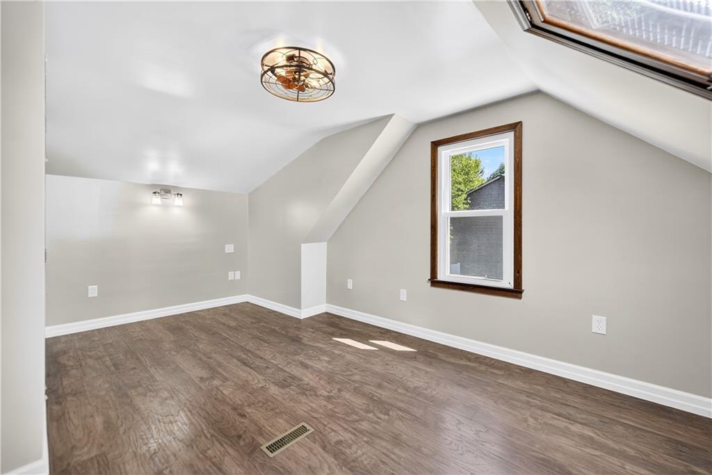 1320 Eckert Road Monaca, PA 15061 - Photo 19 of 30 an empty room with windows and entrance