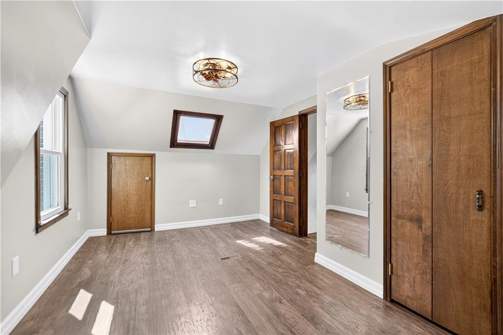 1320 Eckert Road Monaca, PA 15061 - Photo 21 of 30 a view of an empty room and wooden floor