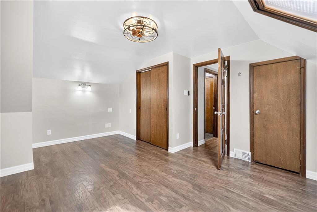 1320 Eckert Road Monaca, PA 15061 - Photo 23 of 30 an empty room with wooden floor and window