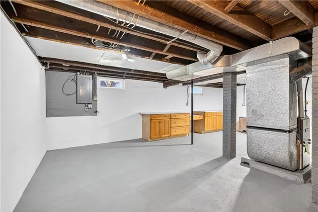 a view of a room with wooden walls